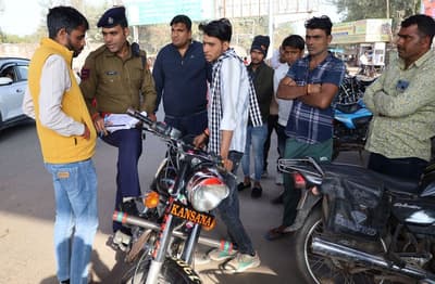 Action taken against bike riders who burst crackers, fine imposed